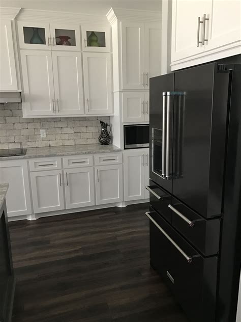 black stainless steel kitchen appliances with wood cabinets|white kitchen cabinets black appliances.